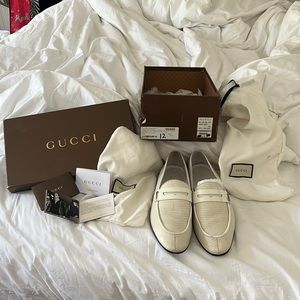 Amazing White Gucci Lizard Skin Gucci Loafers gently worn.